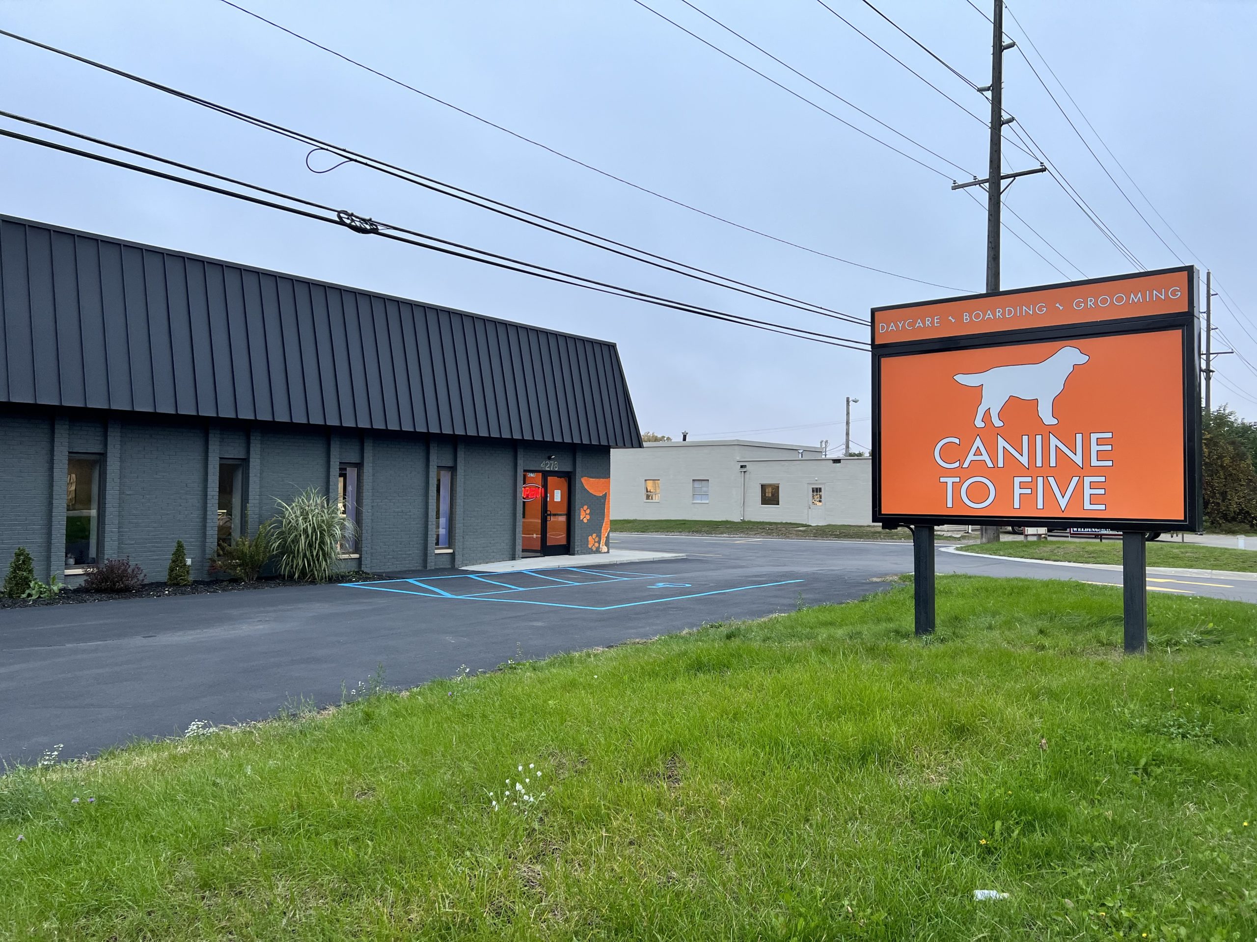 Canine To Five - Commerce Township location's front of building